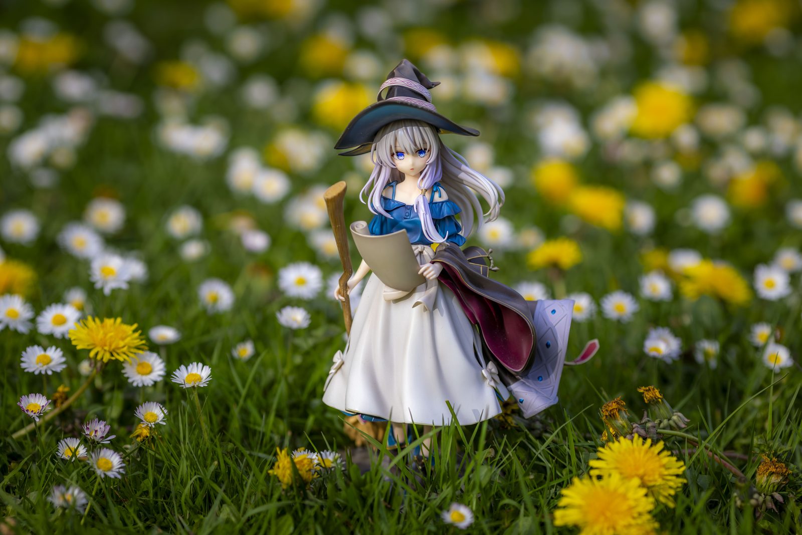 Figure among daisies