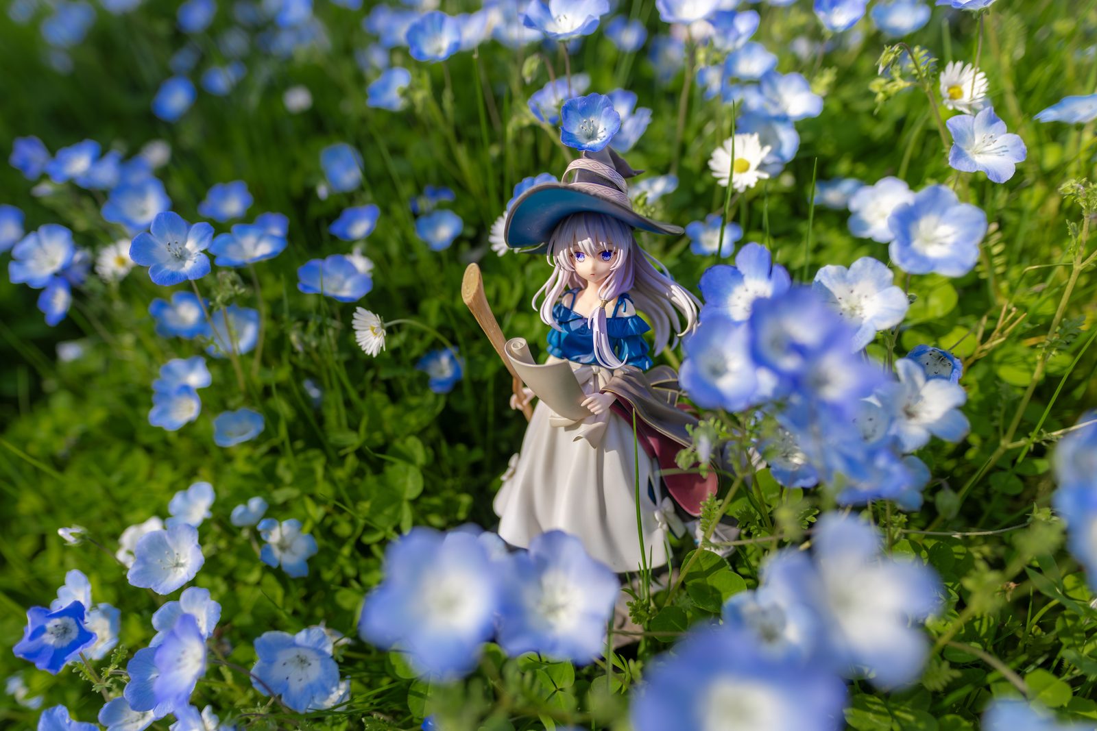 Figure in nemophila sunlit