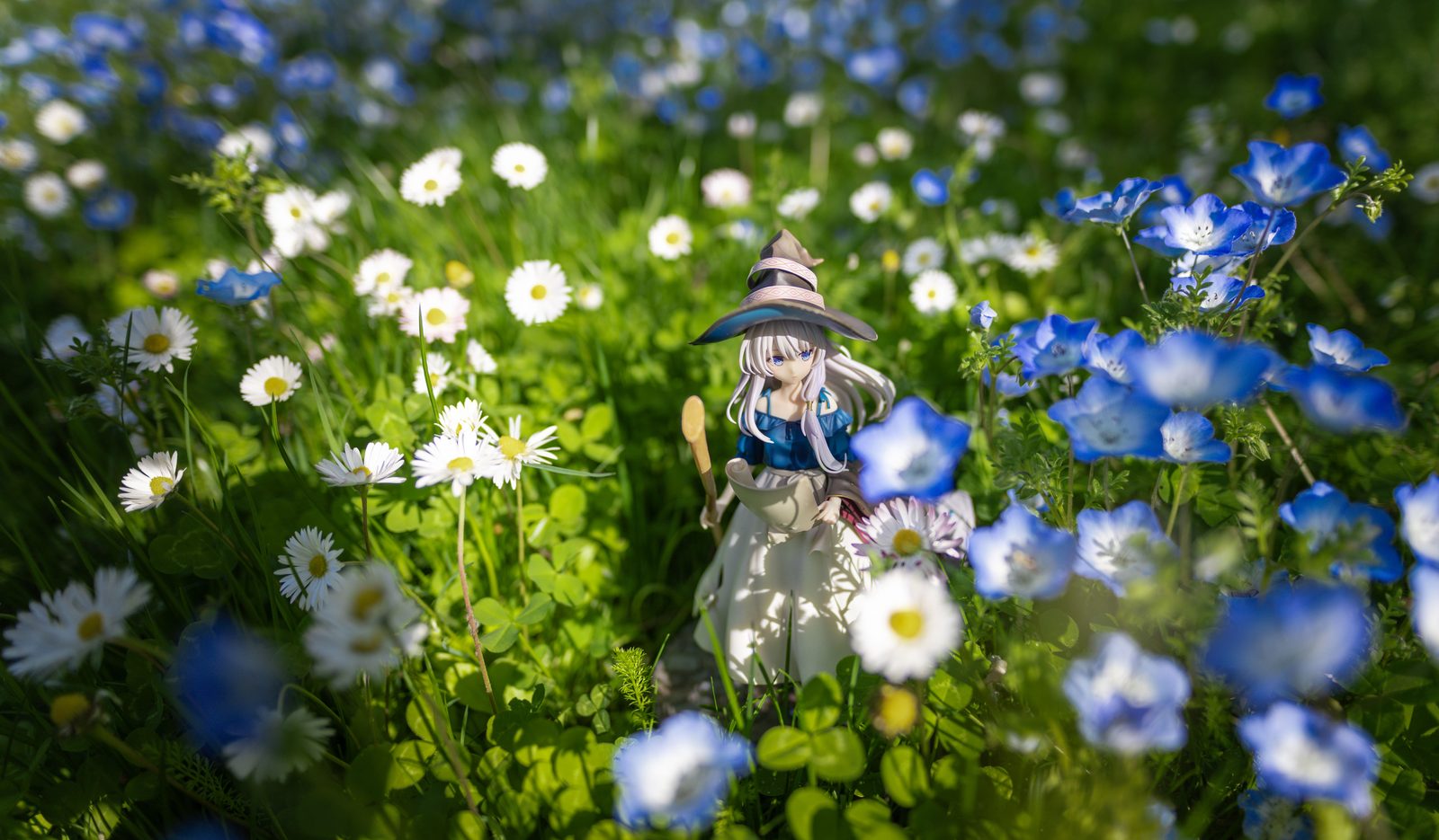 Figure in mixed flower field