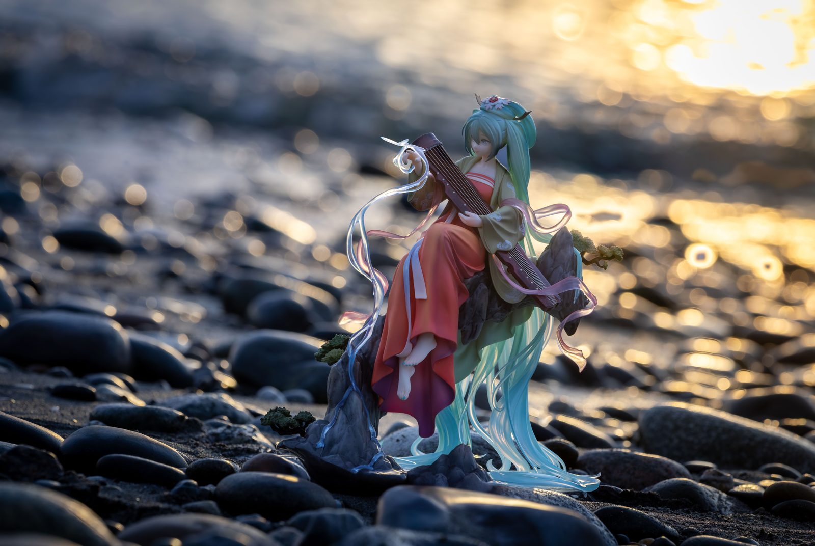 Figure on pebble beach